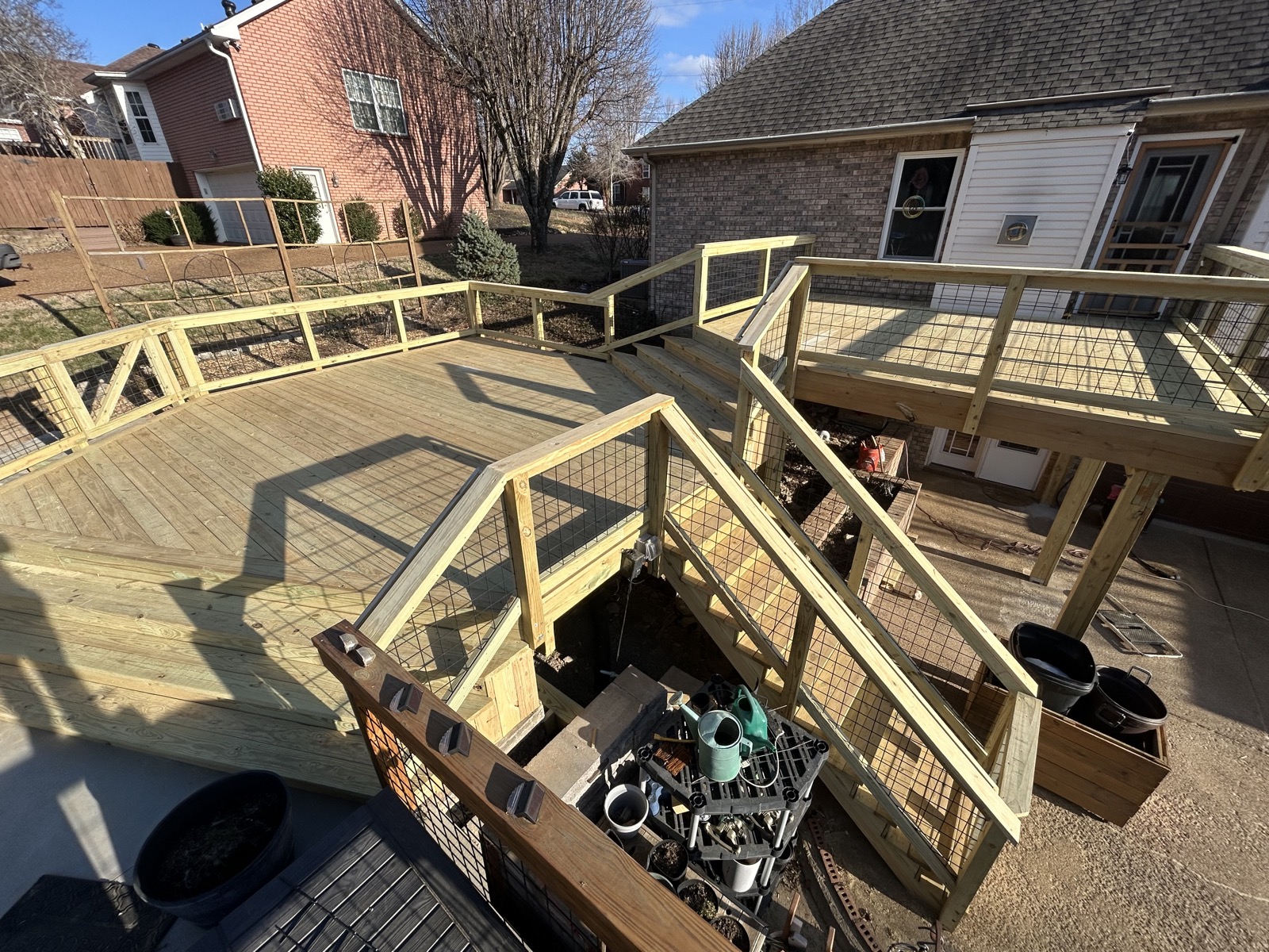 Overhead view of a multi-tier deck with stairs between levels